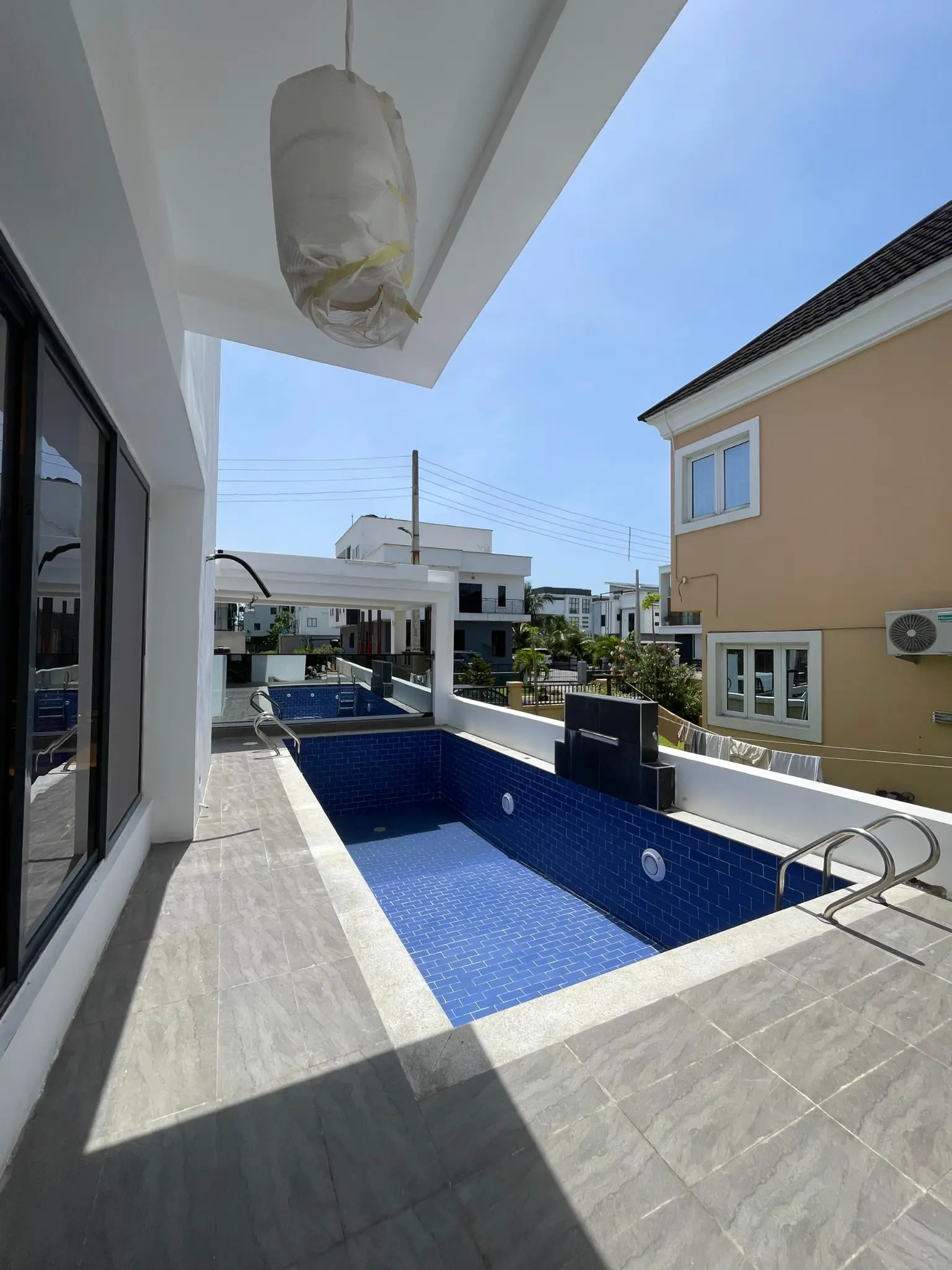 Swimming pool terrace view for the Osapa London duplex