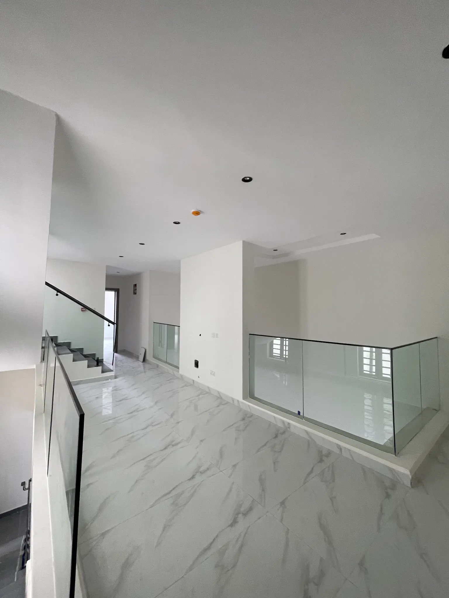 Upper landing and circulation area inside the Ajah duplex