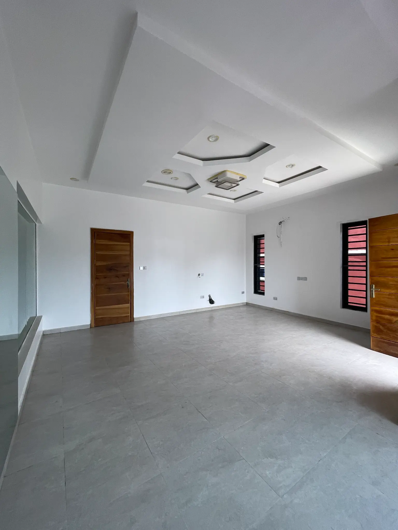Bedroom interior with POP ceiling in the Ikota duplex
